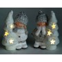 Bambini in ceramica con albero di Natale